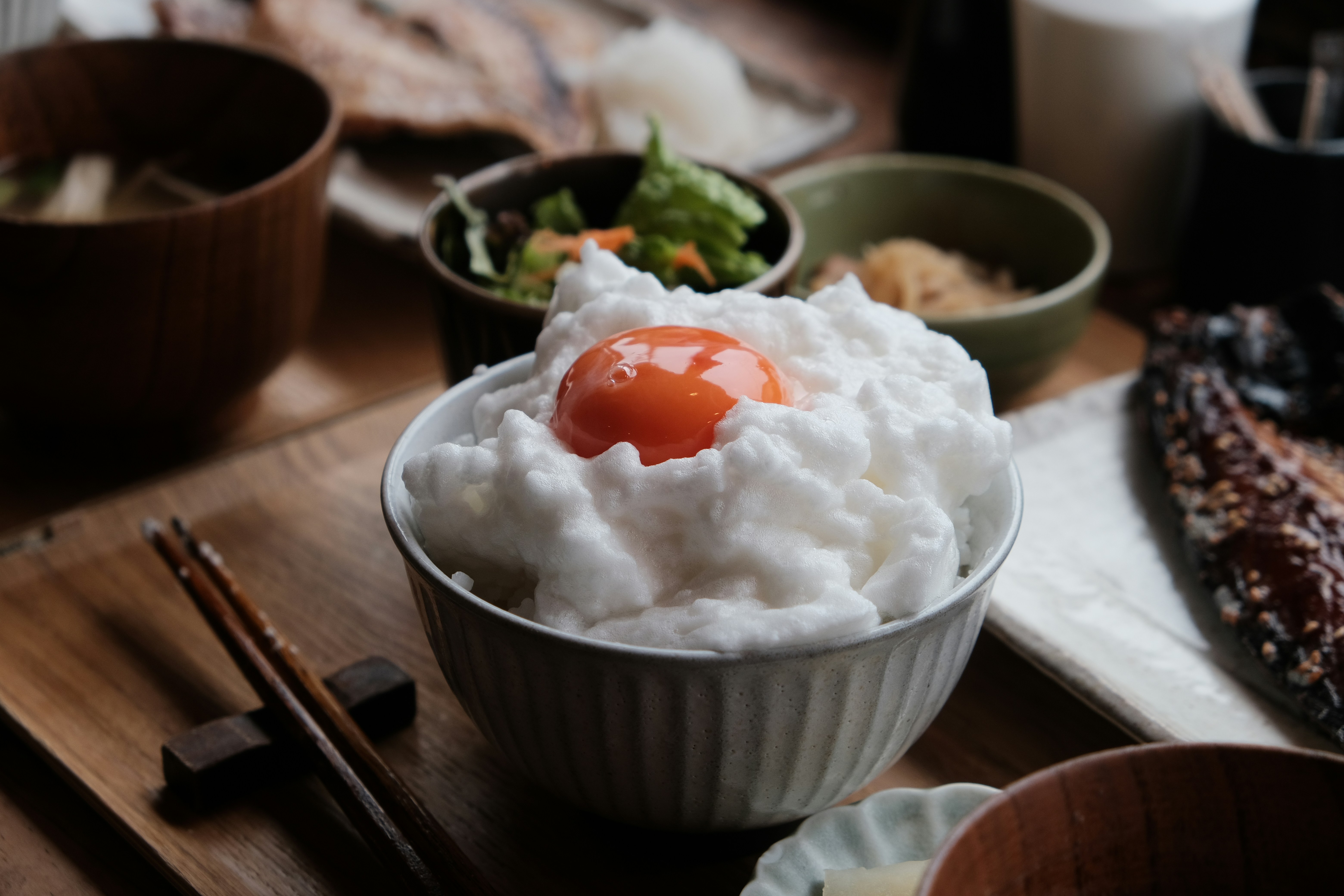 Fluffy egg white cloud with yolk on rice