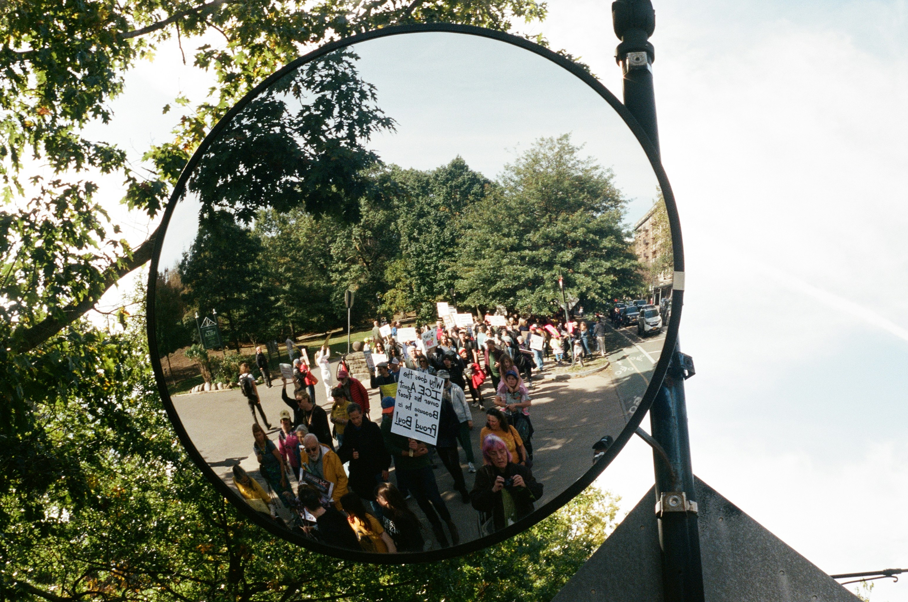 Protestors in convex mirror