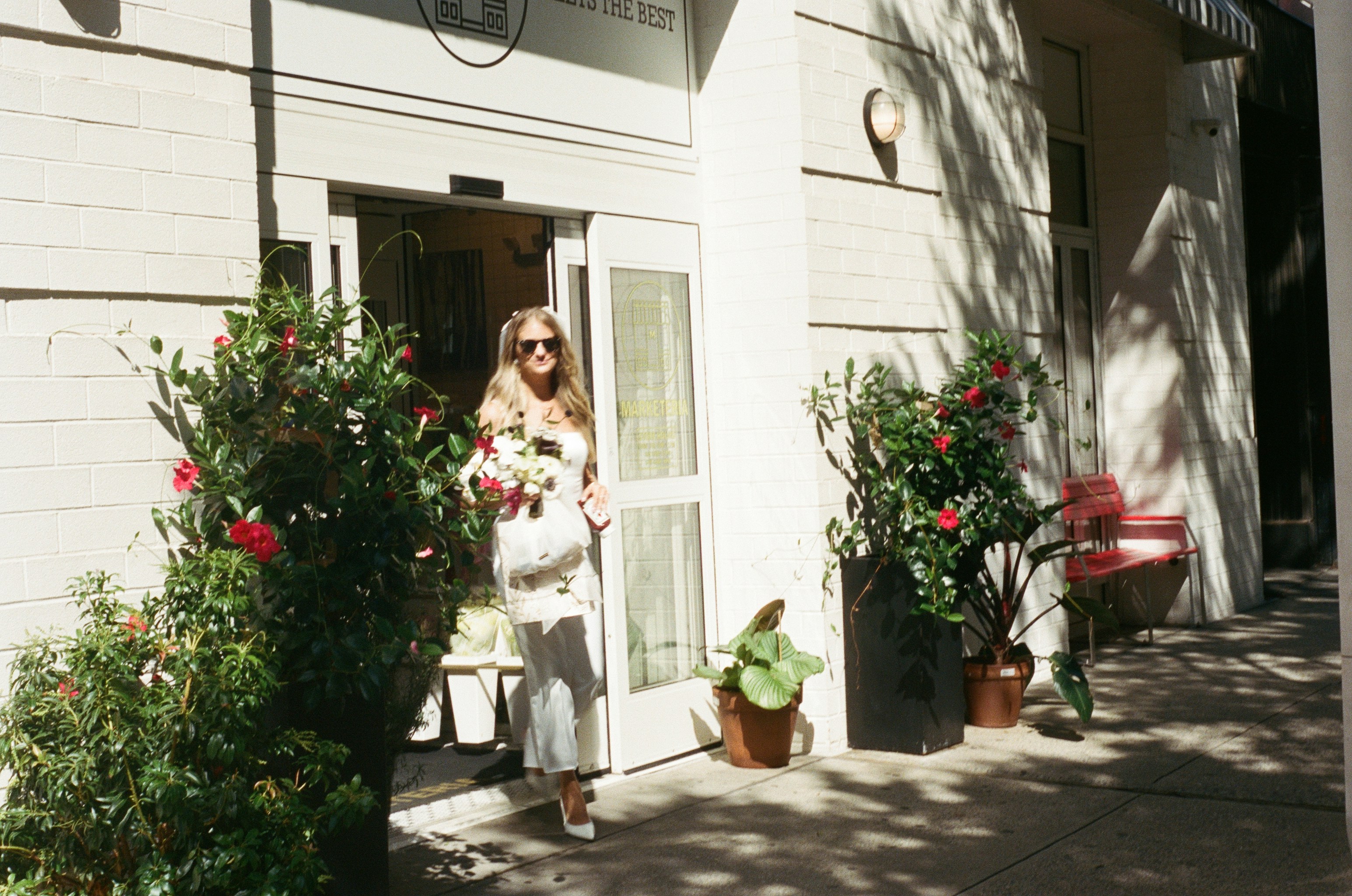 Woman leaves flower with bouquet
