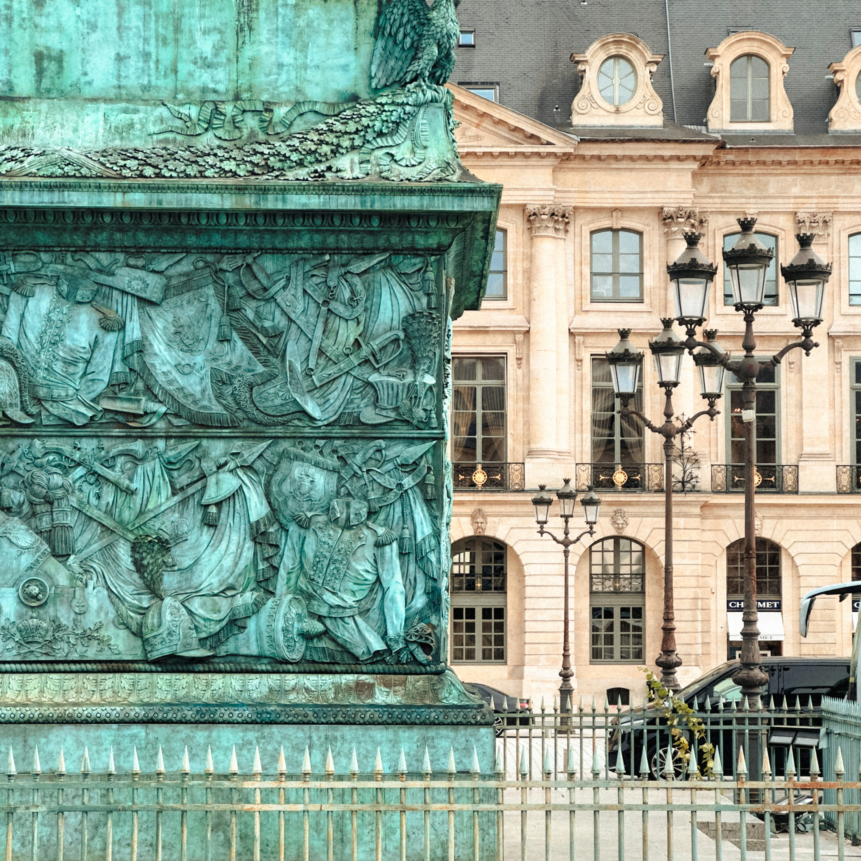 Ornate bronze monument with historic building background photo – Free ...