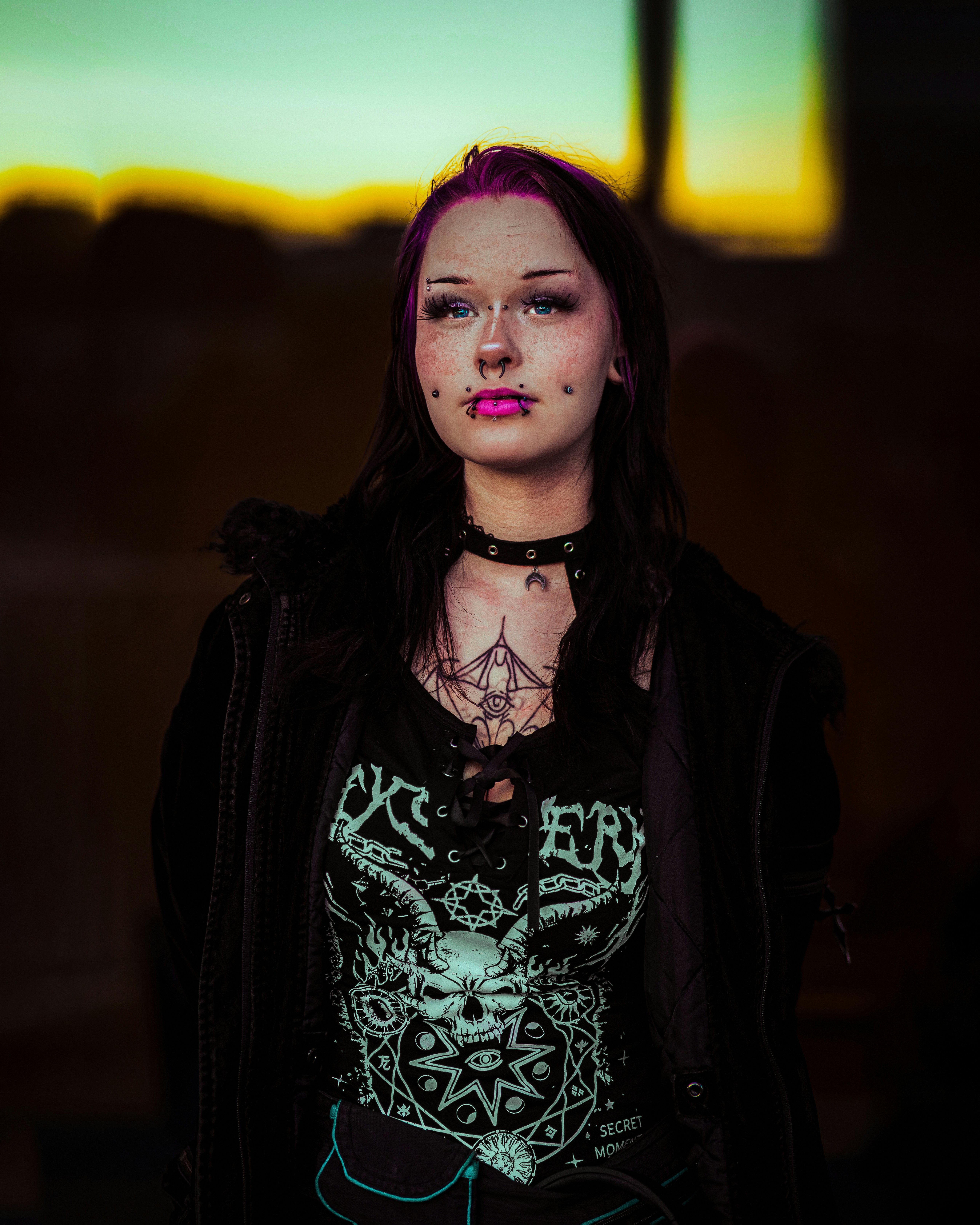 Young woman with pink hair and piercings