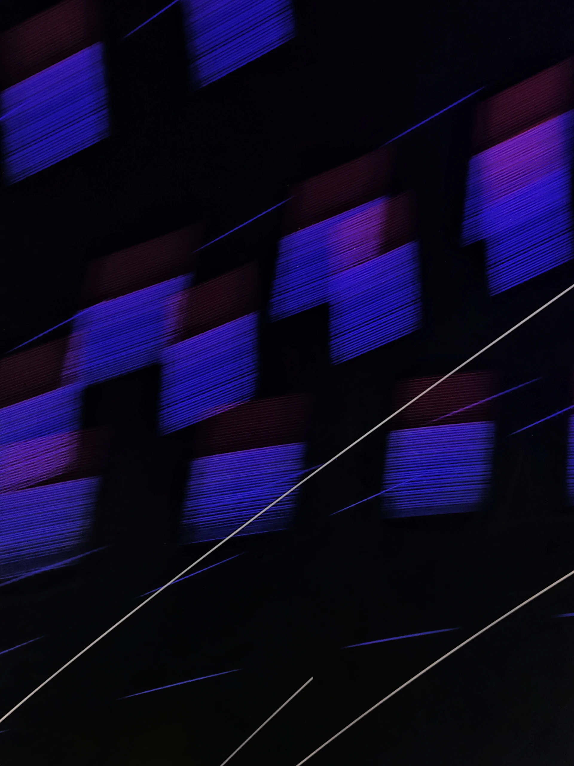 Abstract blur of purple squares and white lines