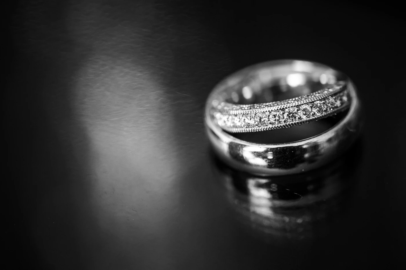 Two wedding bands stacked on top of each other showing the kind of ring detail photograph that translates particularly well to large format wall prints