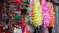 Colorful handmade tassels and ornaments hanging at market