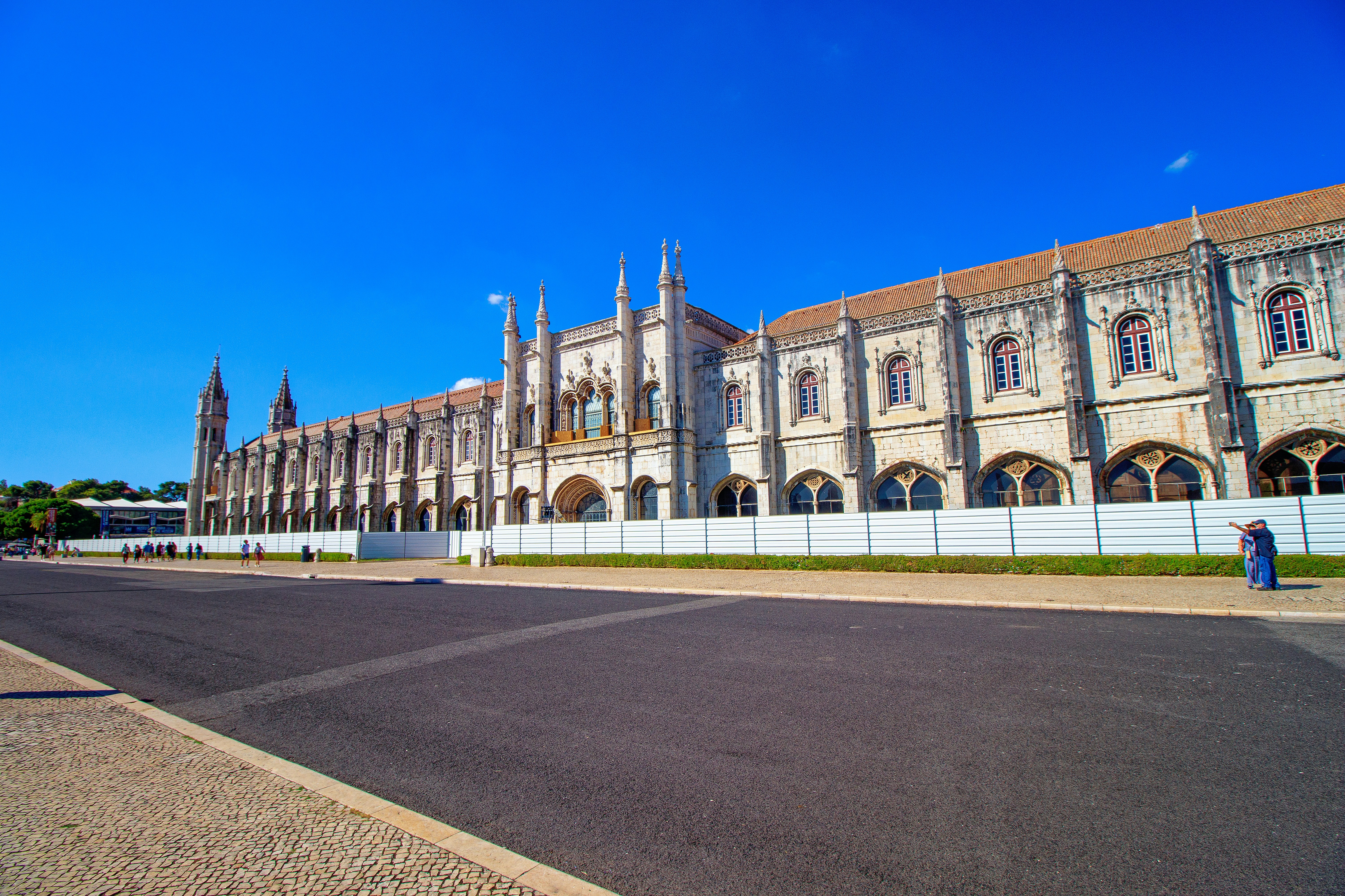 Grand historic building with ornate architecture under blue sky