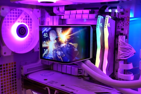 Computer case with rgb lighting and small display.