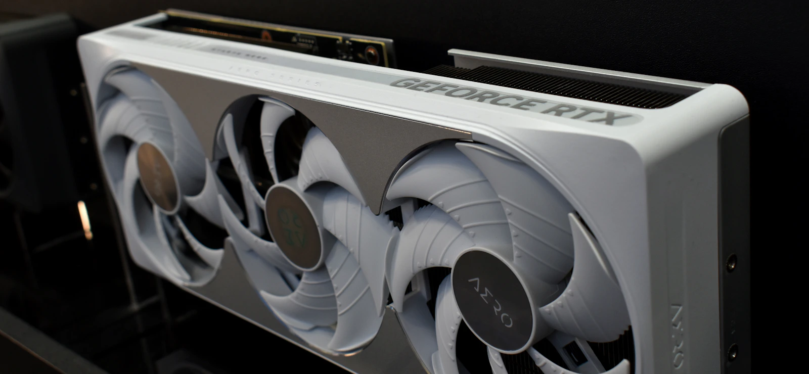 White graphics card with three fans and RTX logo