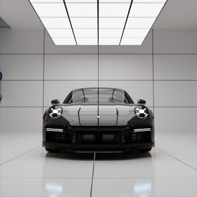 A sleek black sports car parked in a modern showroom.
