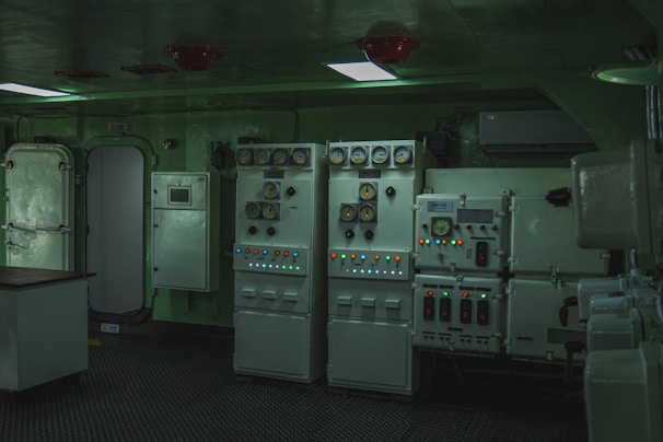 Control room with electrical panels and gauges