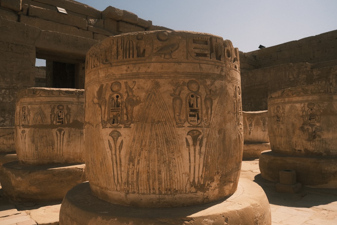 Ancient egyptian hieroglyphs carved on stone columns