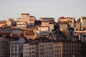 City buildings bathed in warm sunset light.