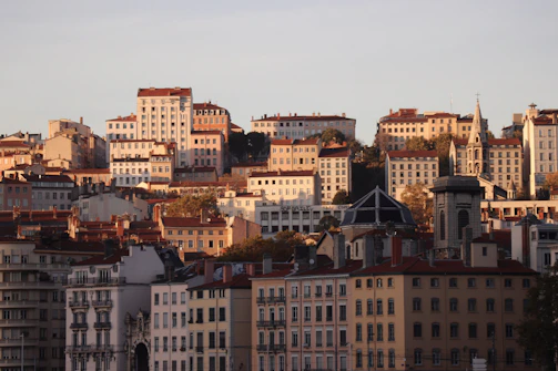 City buildings bathed in warm sunset light.