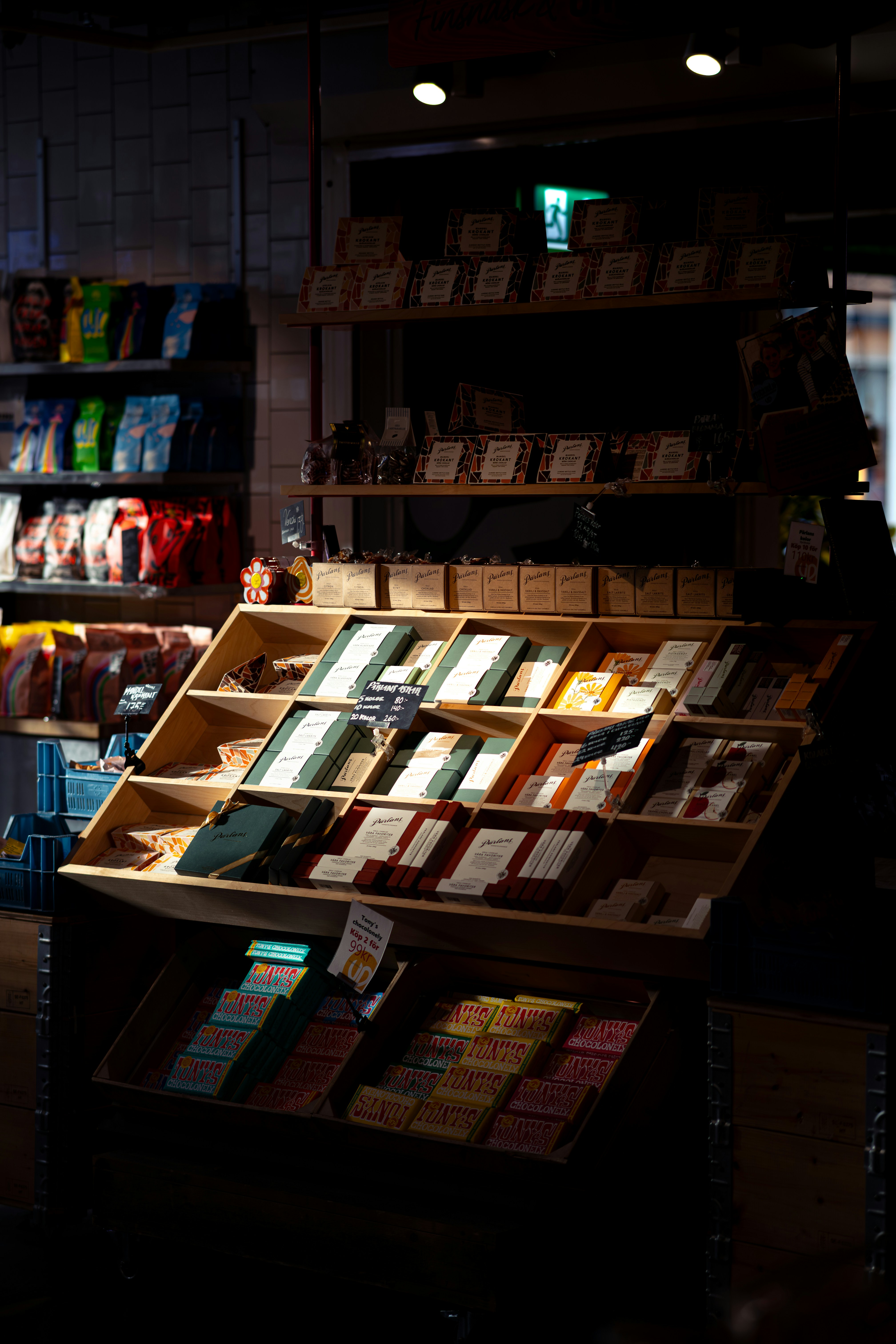 Various packaged goods displayed on shelves in a store.