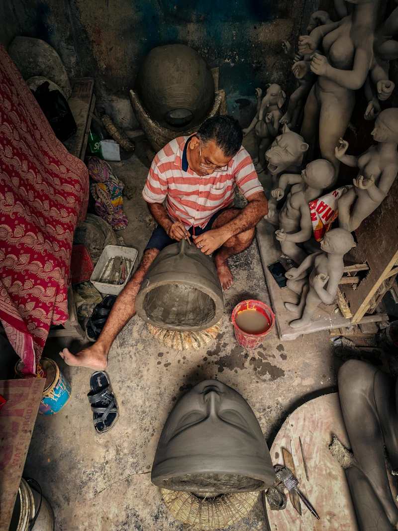 Artisan making idol