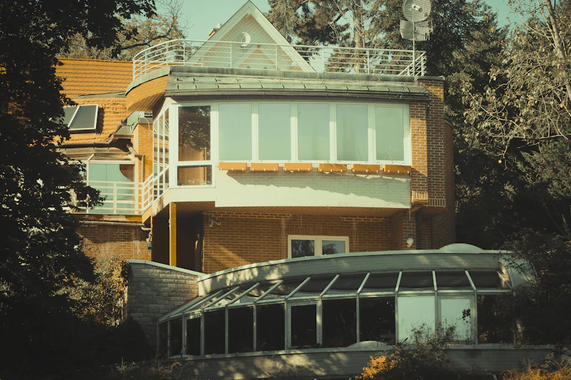 Contemporary luxury bungalow exterior with expansive glass facade