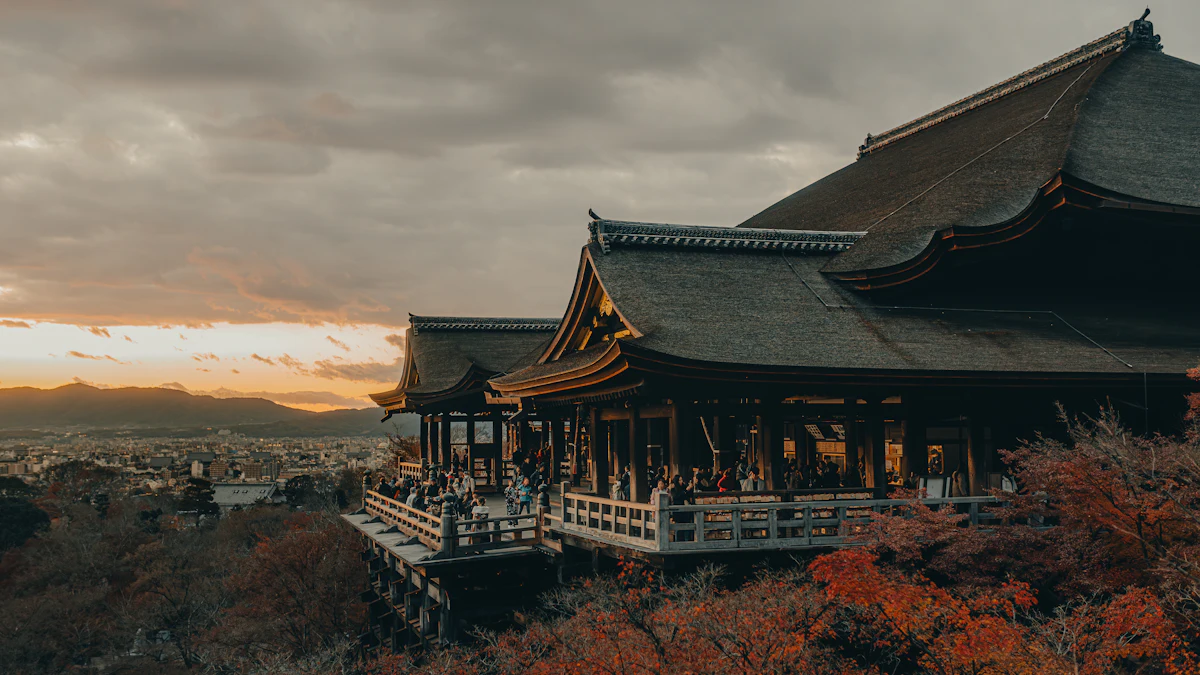 Kyoto temple pagoda seen from a rooftop viewpoint at sunset