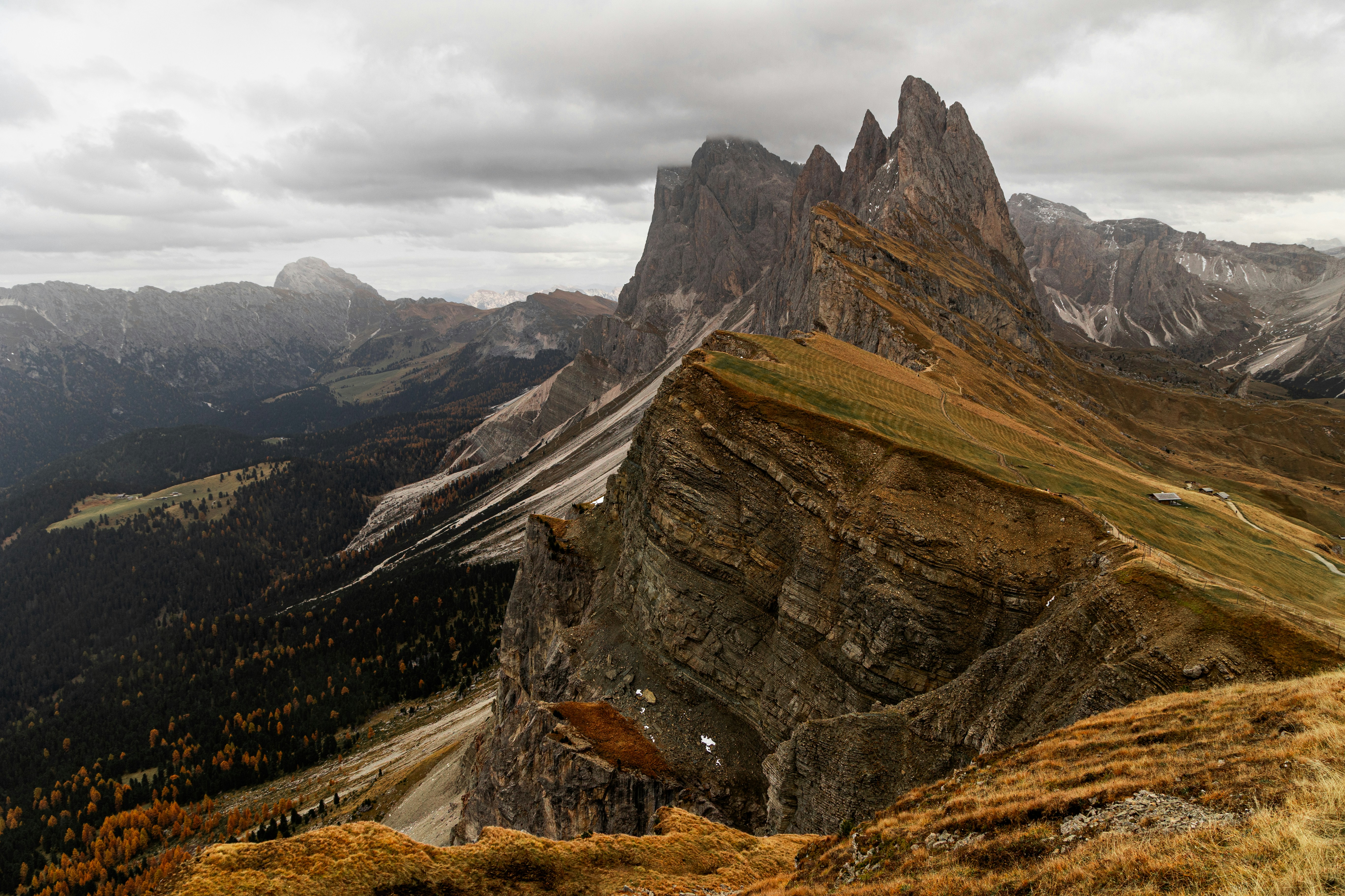 Jagged mountain peaks under a cloudy sky