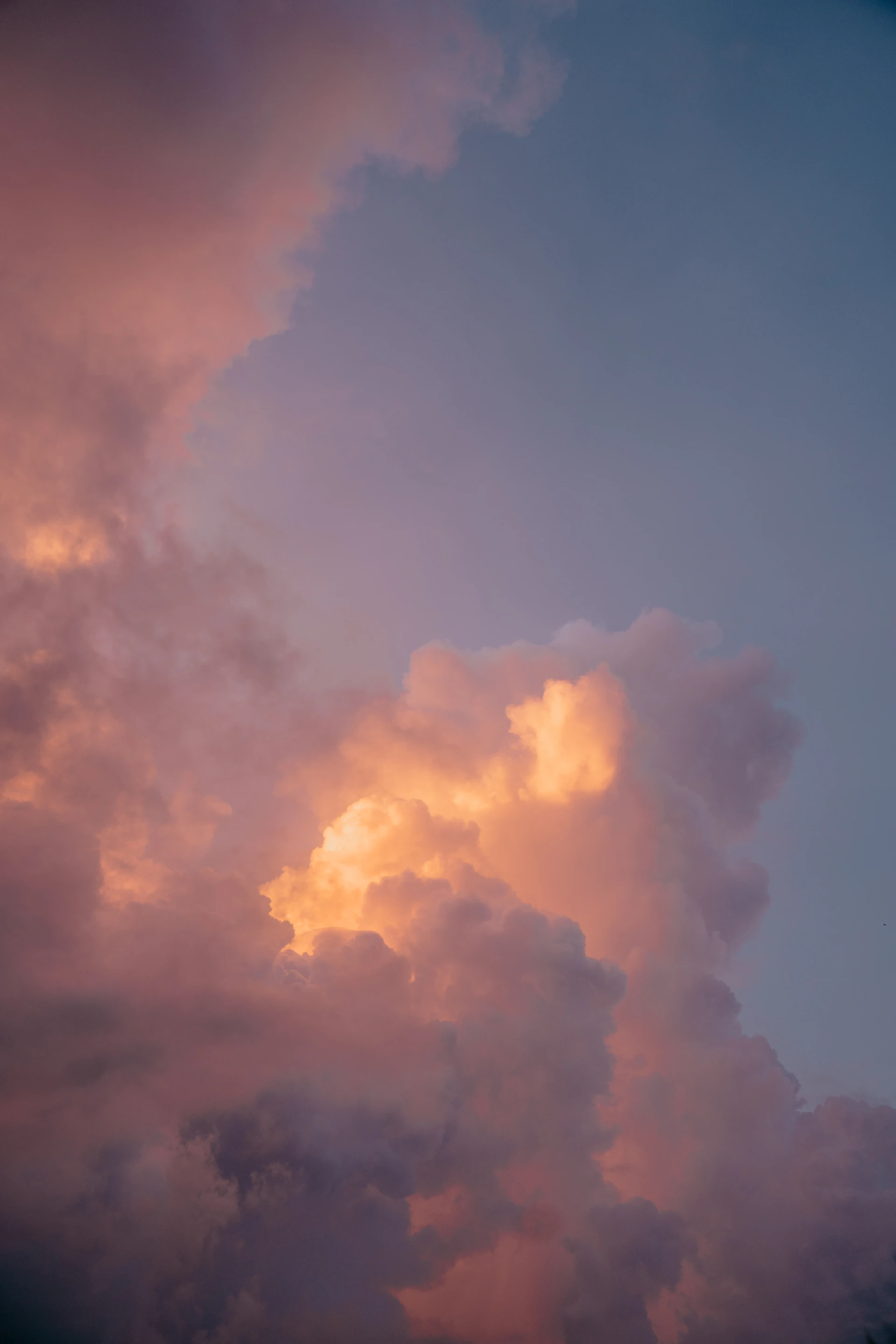 Dramatic clouds illuminated by sunset light
