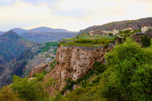 Mountain village nestled on a cliff edge.