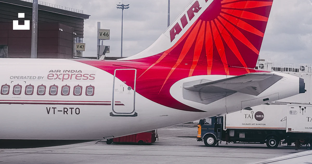 Vt Rto Air india express airplane tail with logo at airport photo – Free Air ...