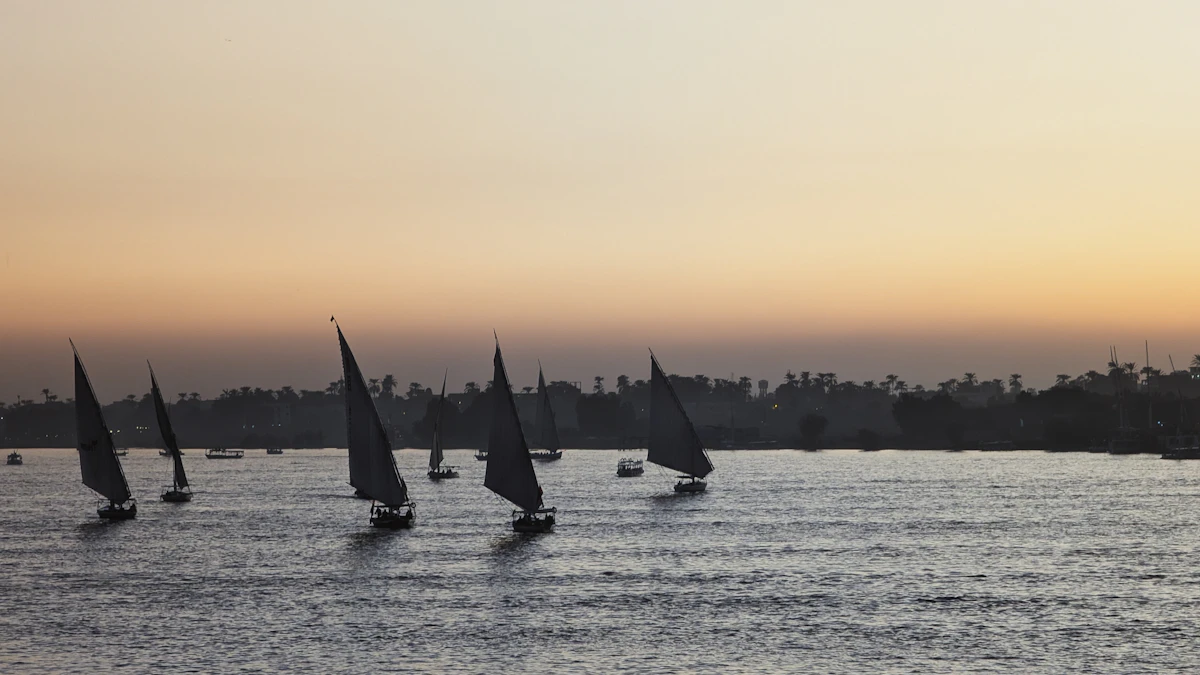 Felucca sailboats on the Nile at sunset