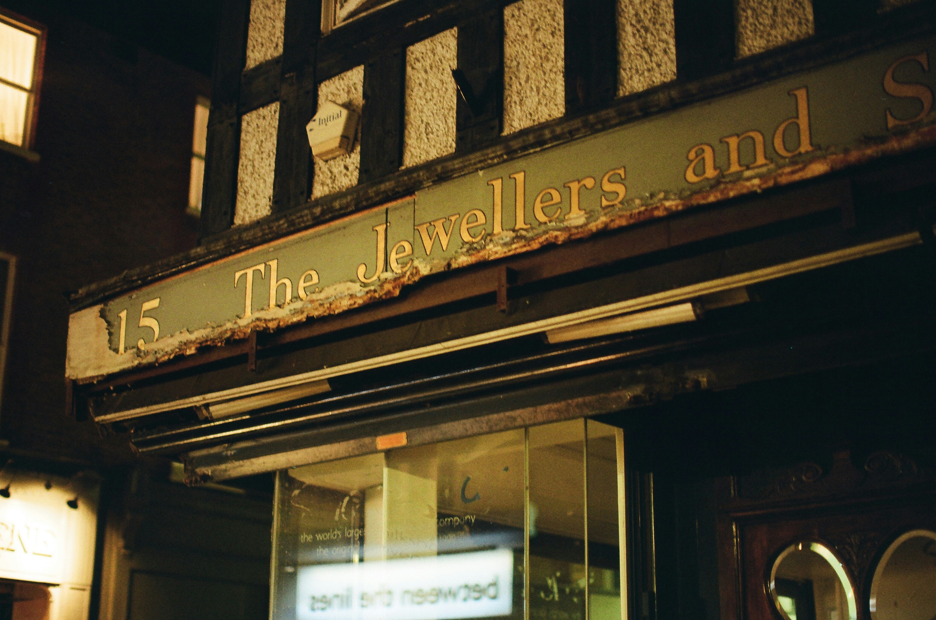 The jewellers and silversmiths shop sign at night