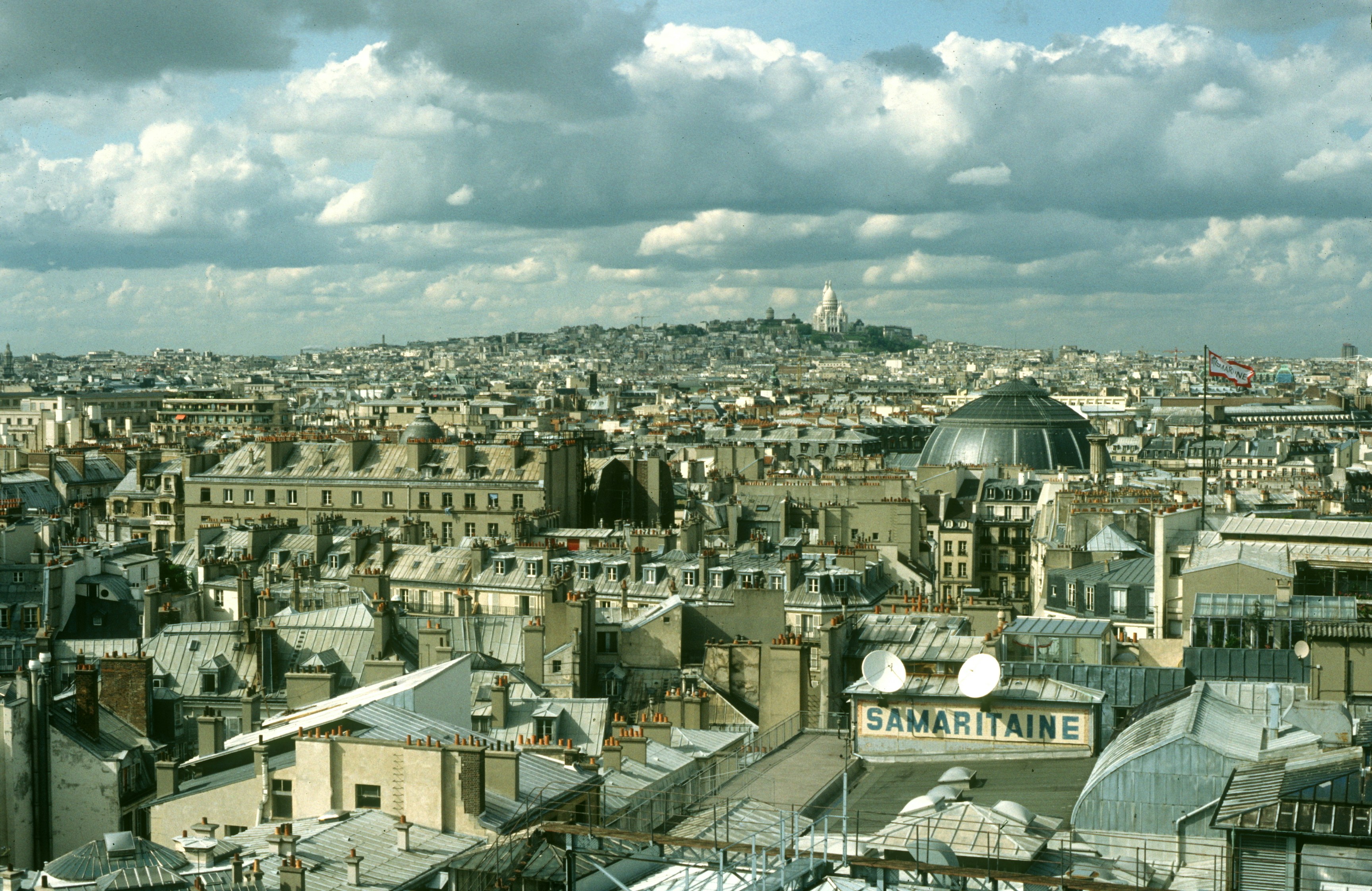 Rooftops of paris with sacré-cœur basilica in distance