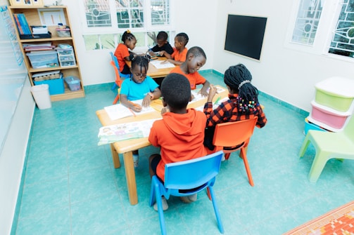 Children sitting at desks in a classroom