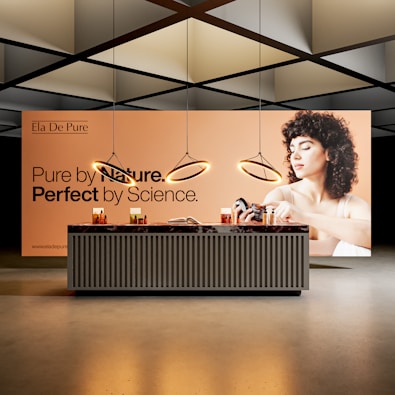 Modern display counter with promotional backdrop
