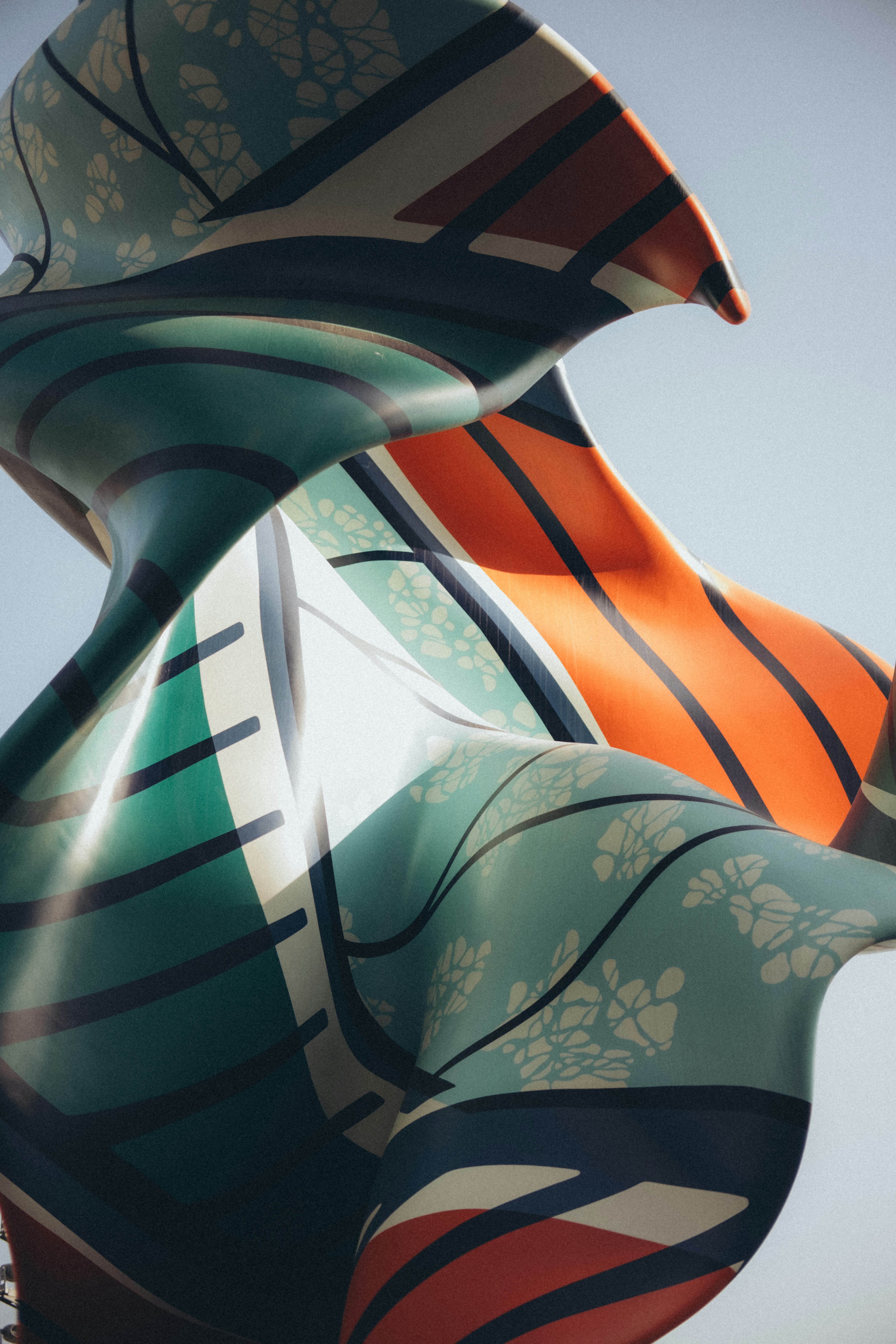 Abstract sculpture with flowing lines and patterns