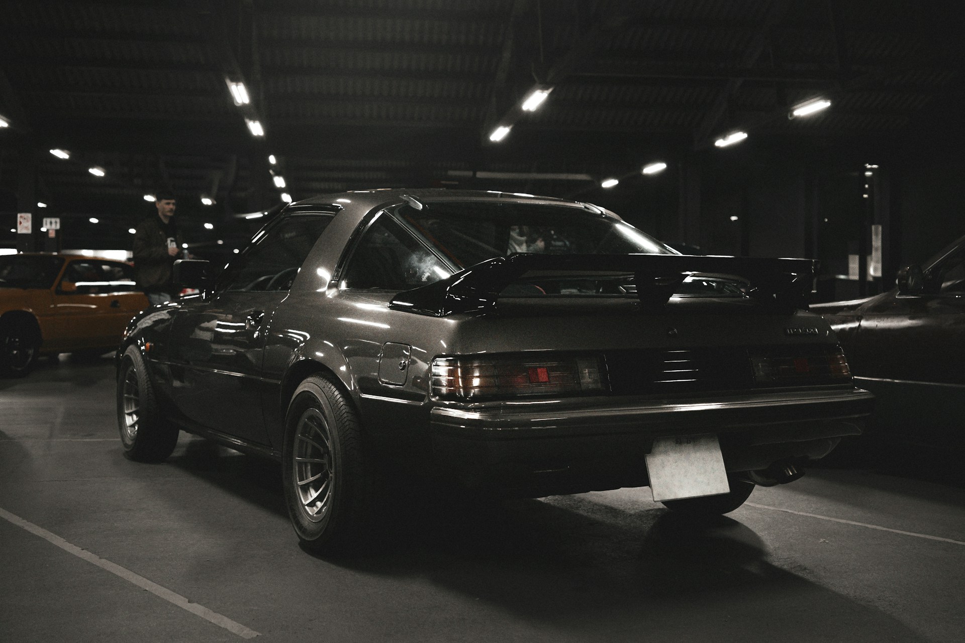 Rear view of a dark vintage sports car