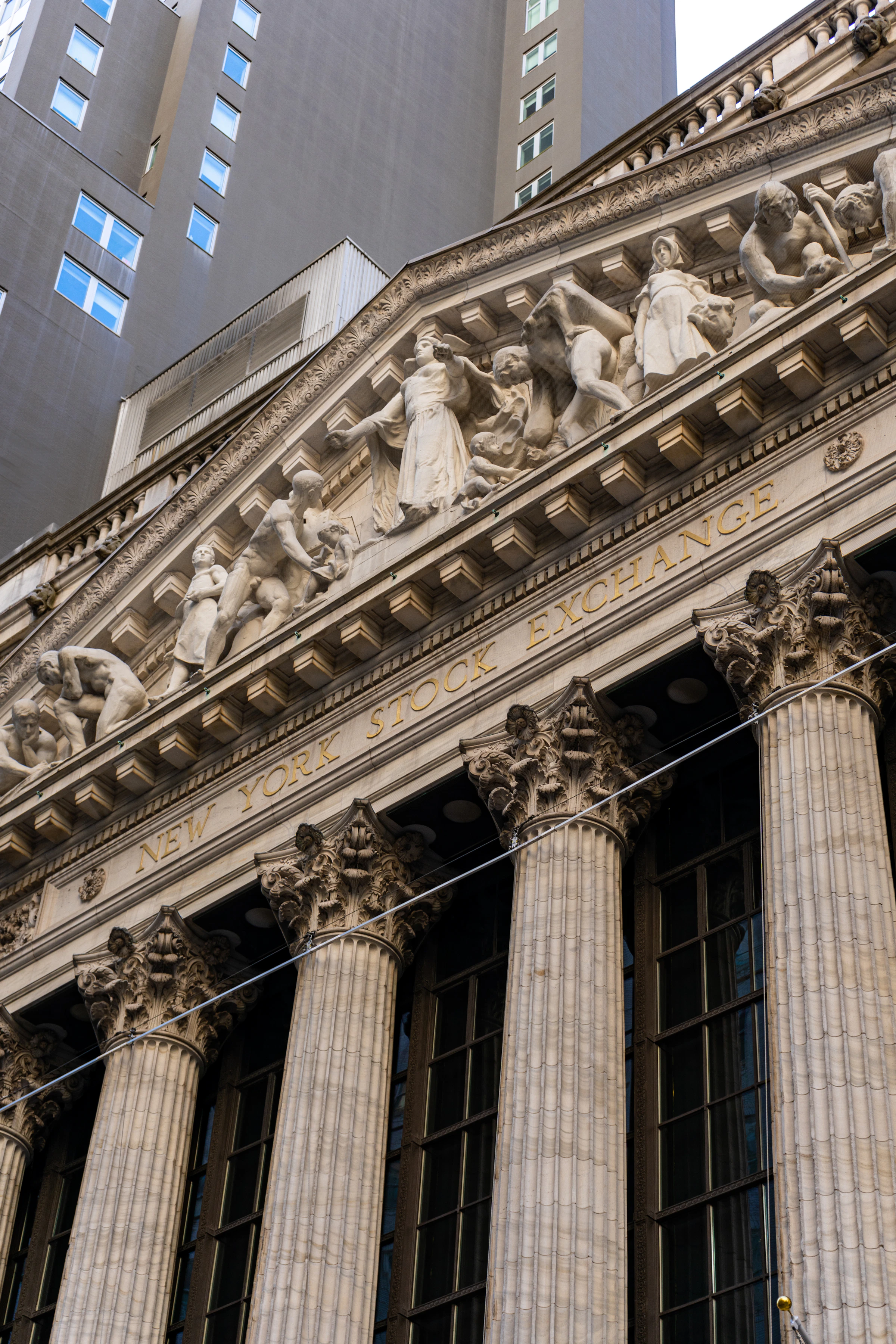 The facade of a stock exchange at dawn