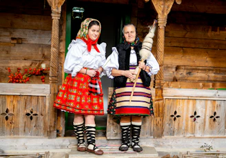 Two women in traditional romanian folk costumes