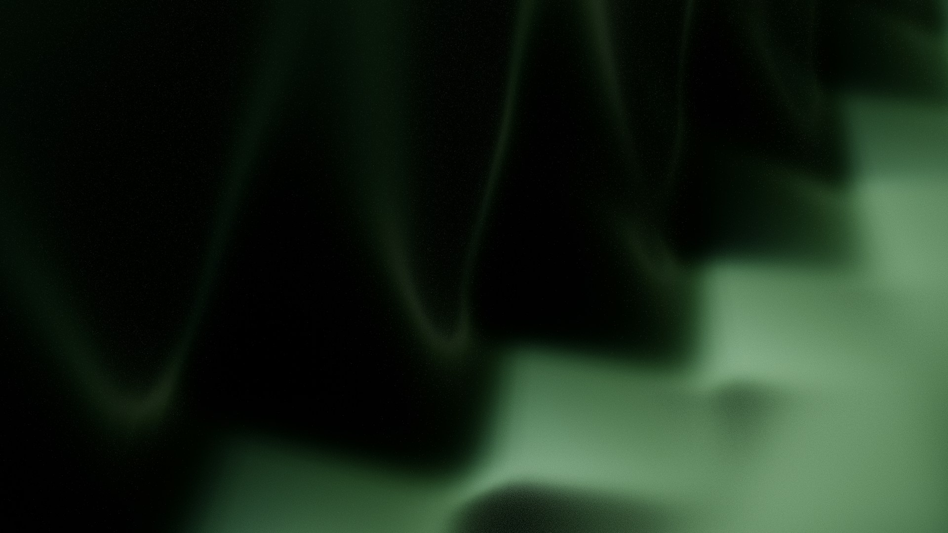 Dark green fabric with subtle light highlights