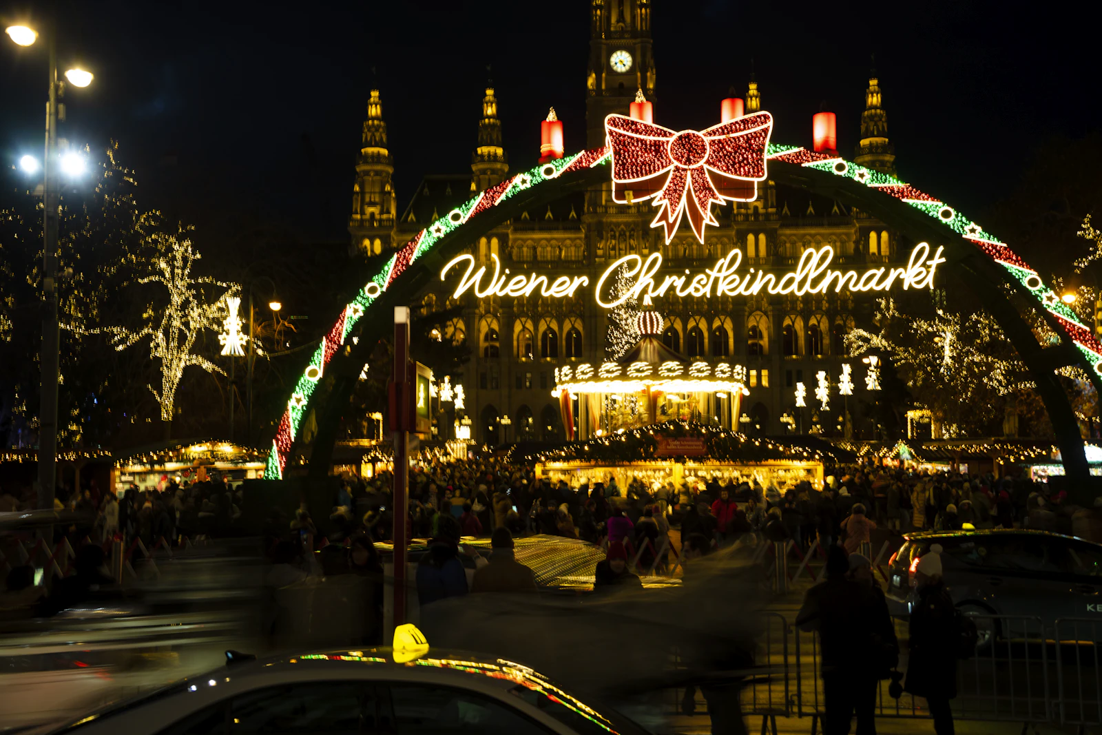 Vienna's Christmas market glowing with festive lights at night