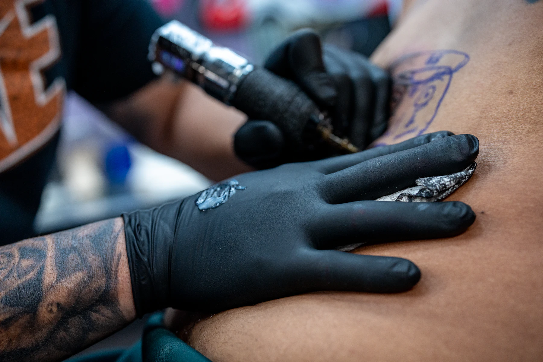 Eternal Tattoo & Piercing Manitoba — artist tattooing client