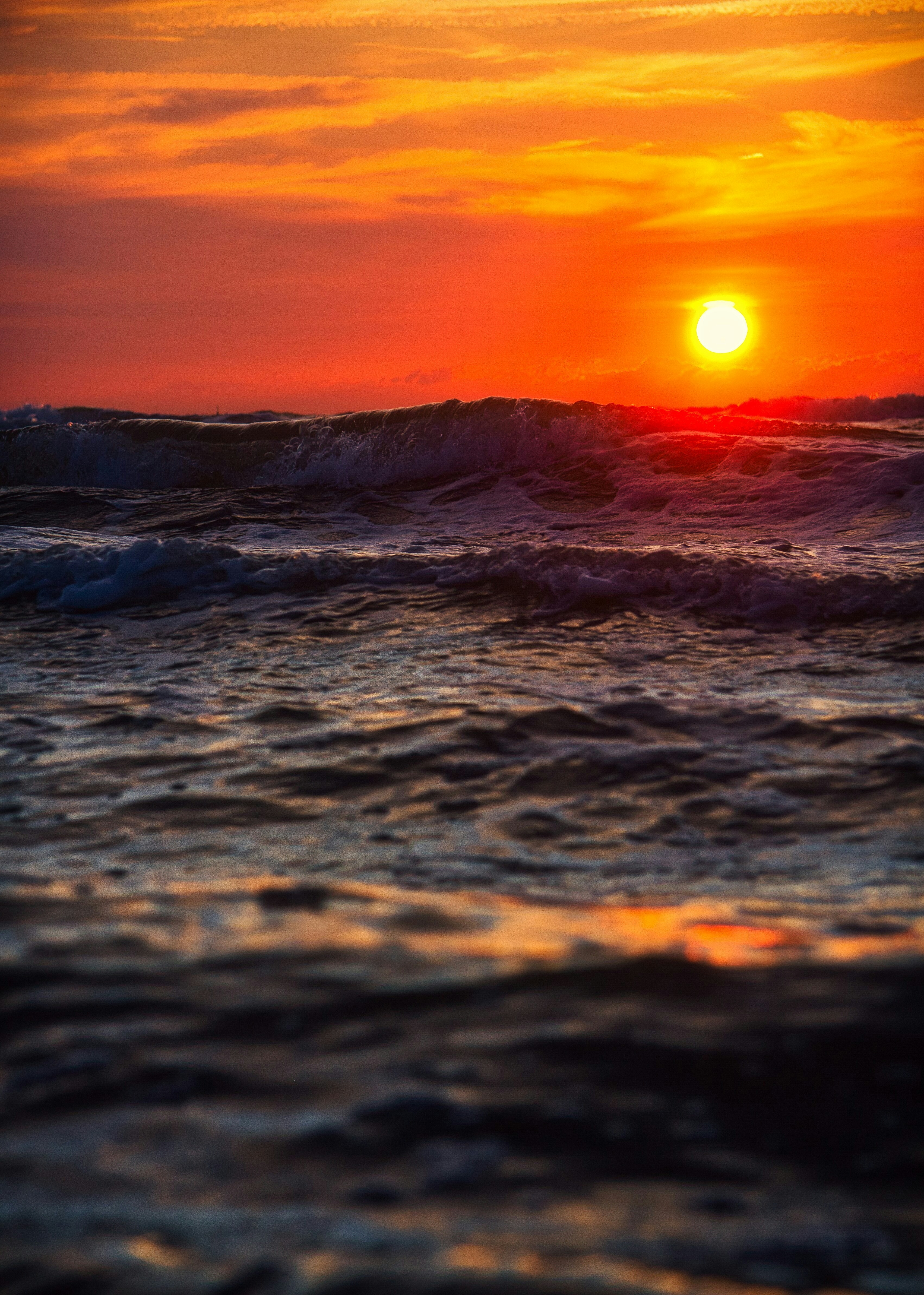 Fiery sunset over the ocean waves