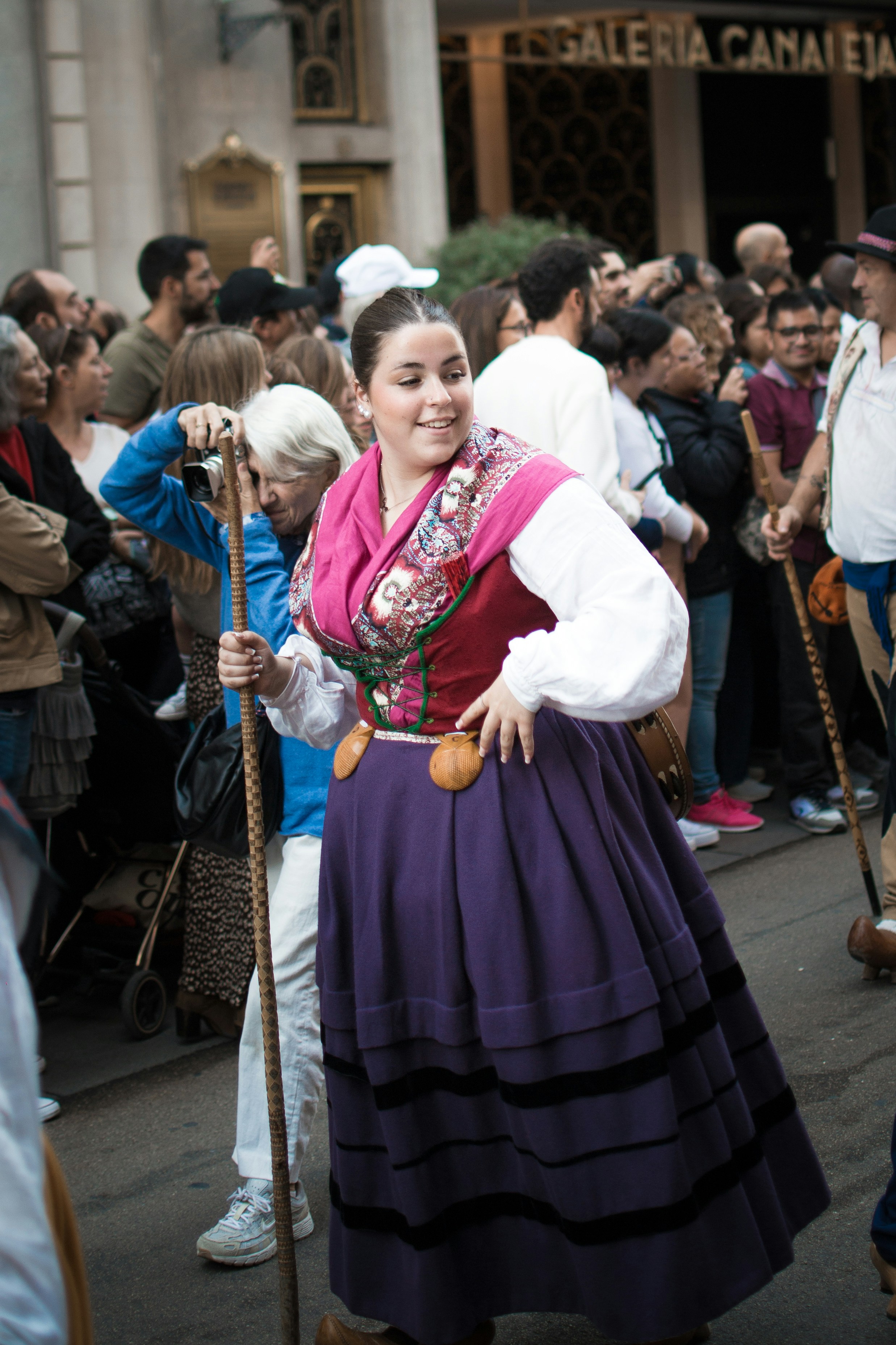 Woman in traditional dress at a festival
