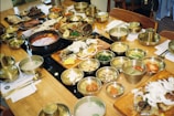 A table full of korean food and side dishes