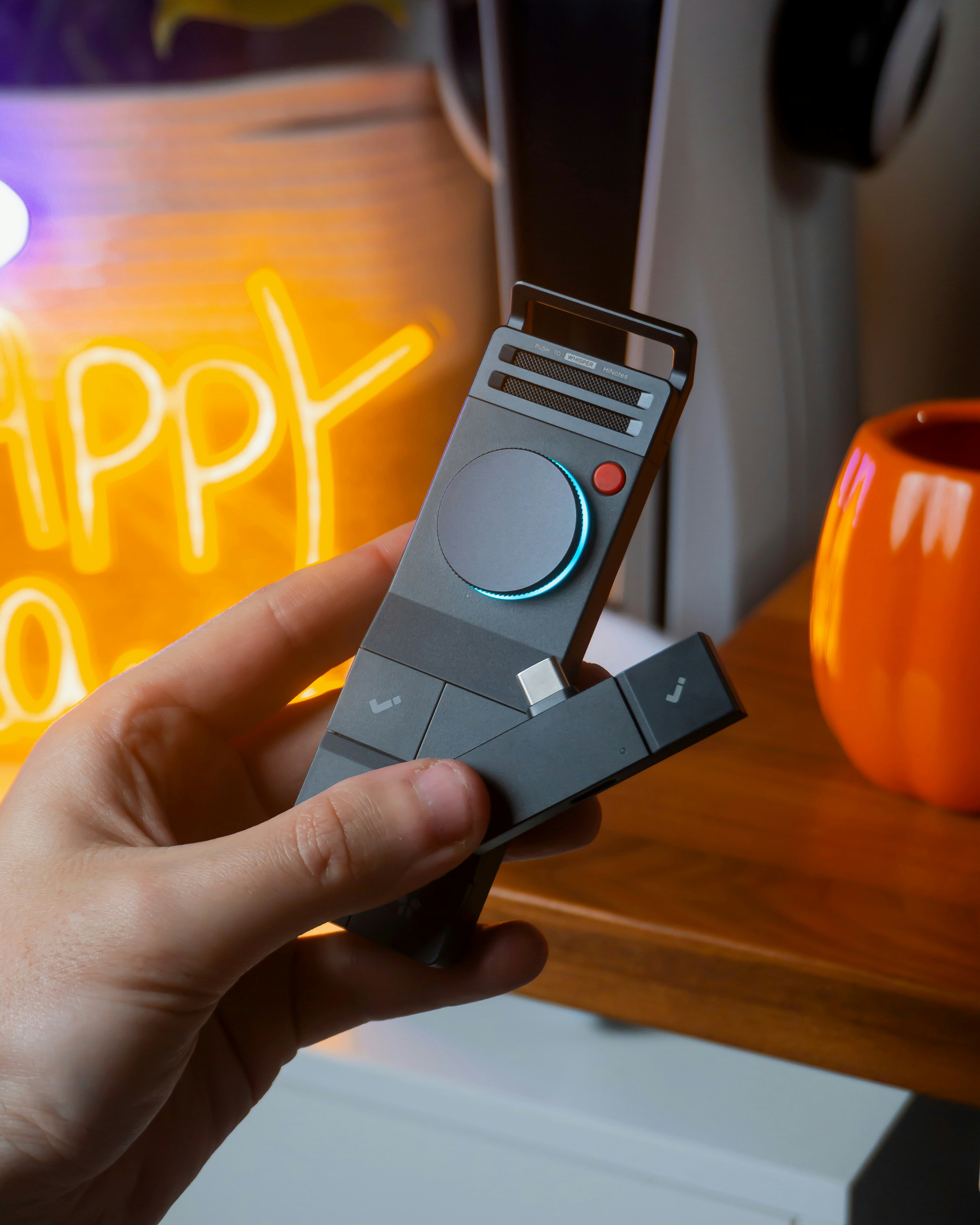 A person using a tablet with headphones, with abstract AI and soundwave graphics overlaid.