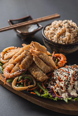 Fried seafood and vegetables with rice and rice
