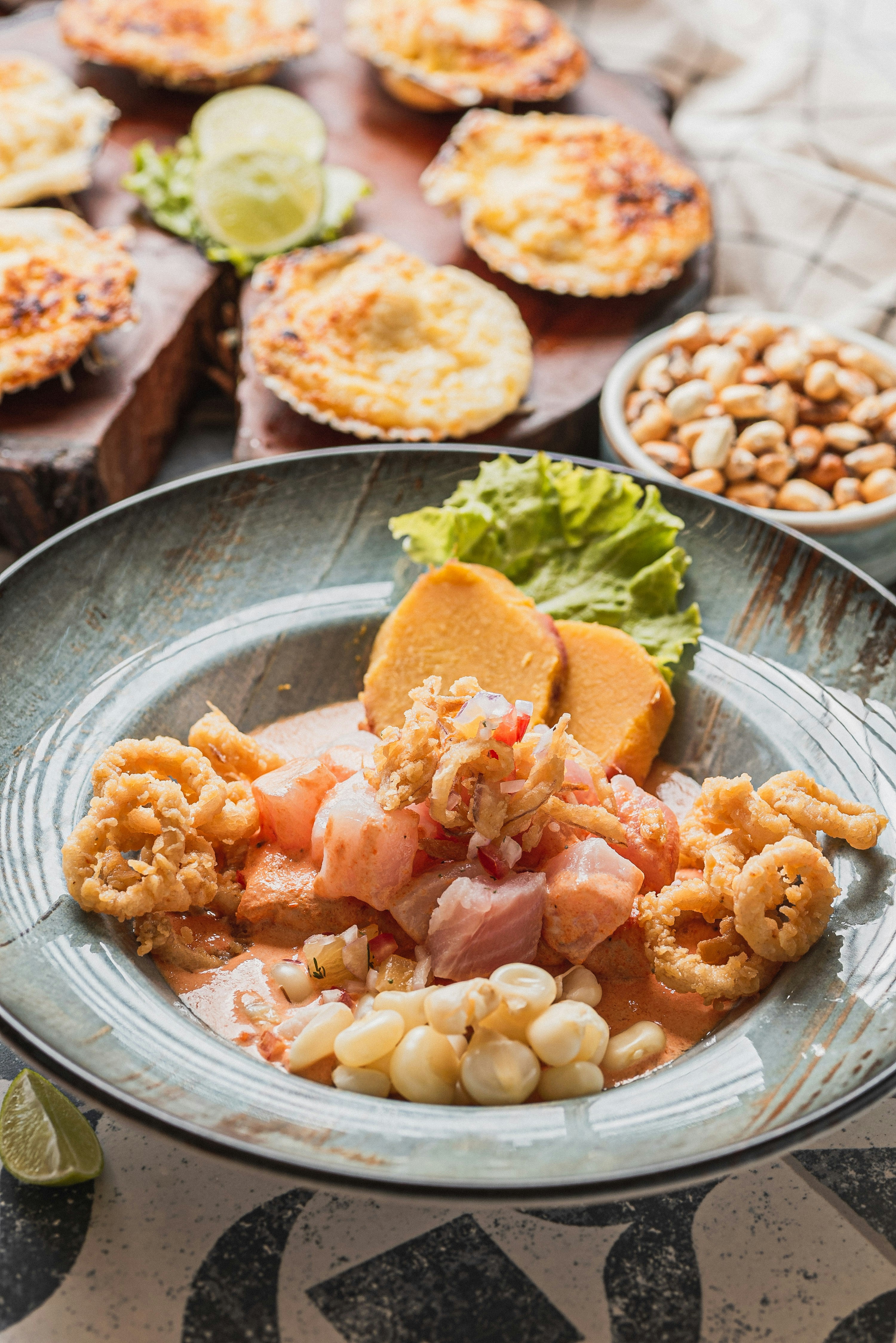 Ceviche with sweet potato, corn, and fried calamari