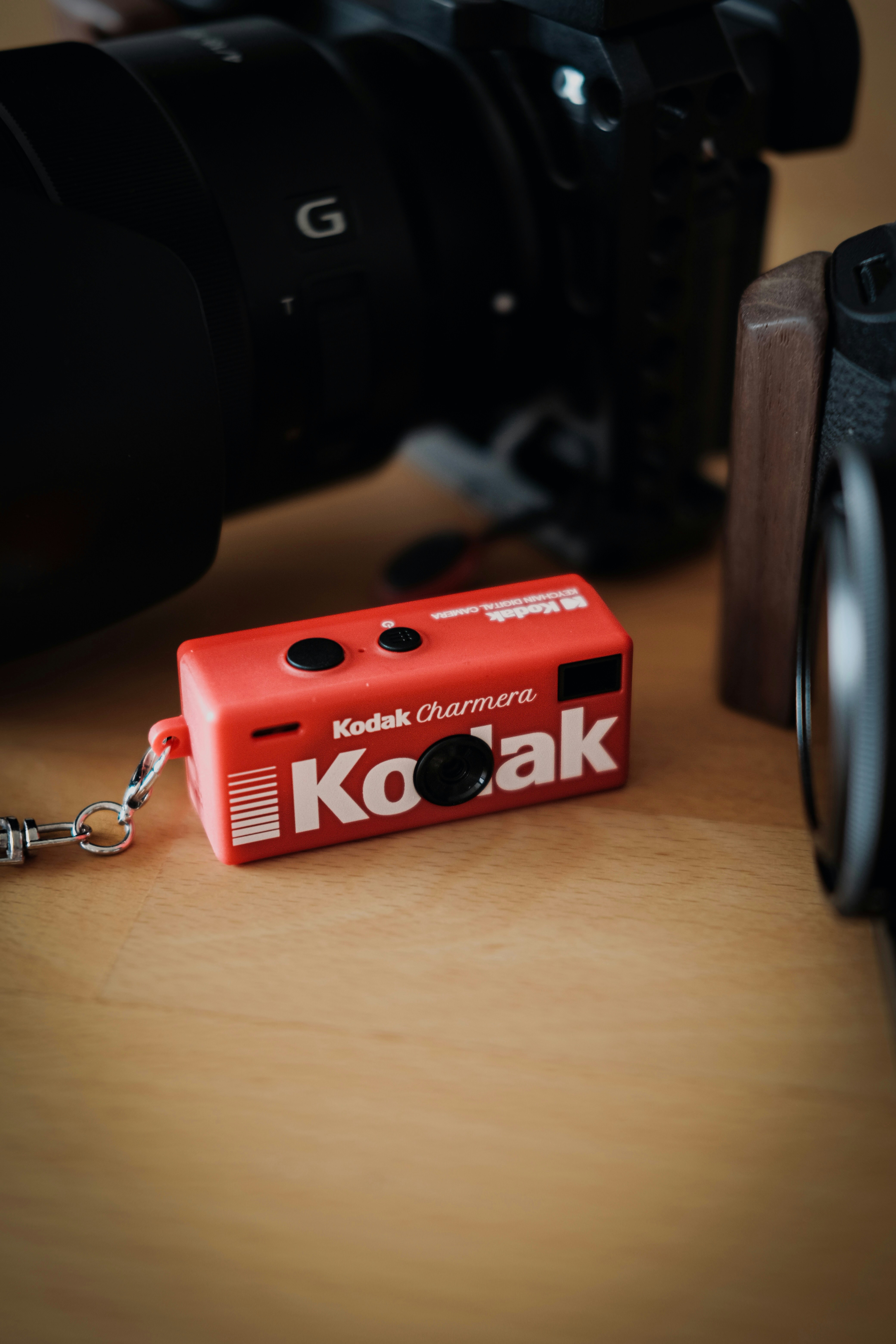 A small red kodak camera keychain photo – Free Green Image on Unsplash