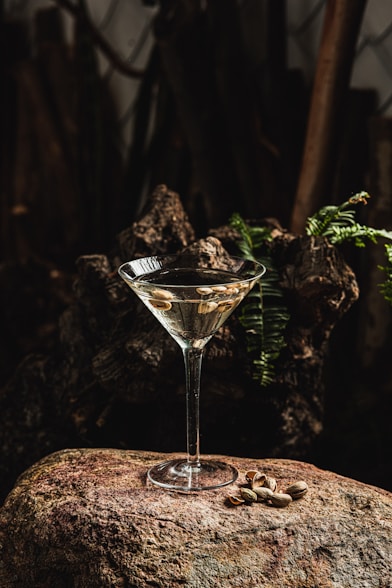Martini with pistachios on a rock