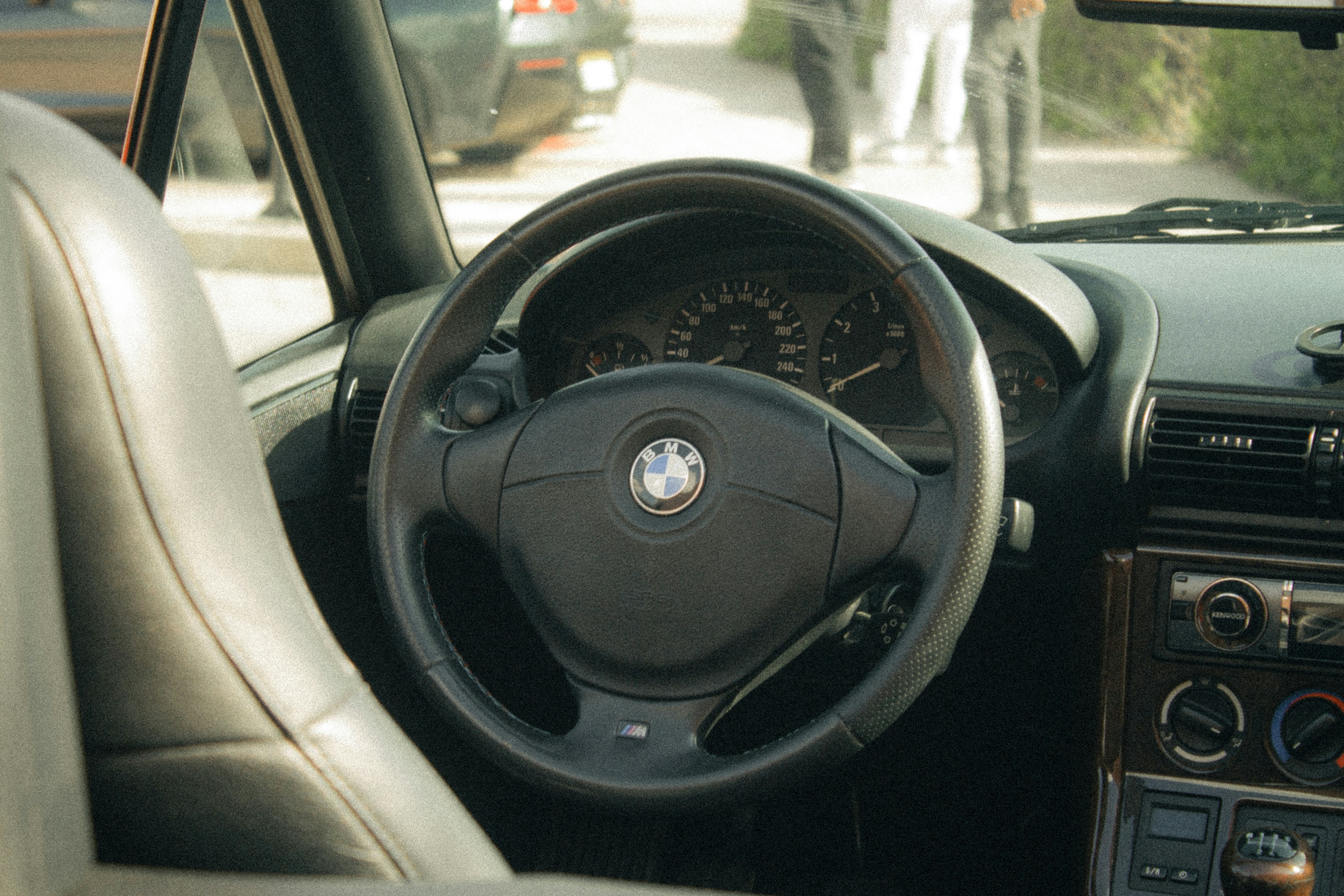 steering wheel, driving perspective, car interior, road view  , ilustrasi artikel Discover Stunning Steering Wheel POV Wallpapers to Elevate Your Screen 3