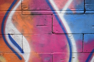 Colorful graffiti art on a brick wall