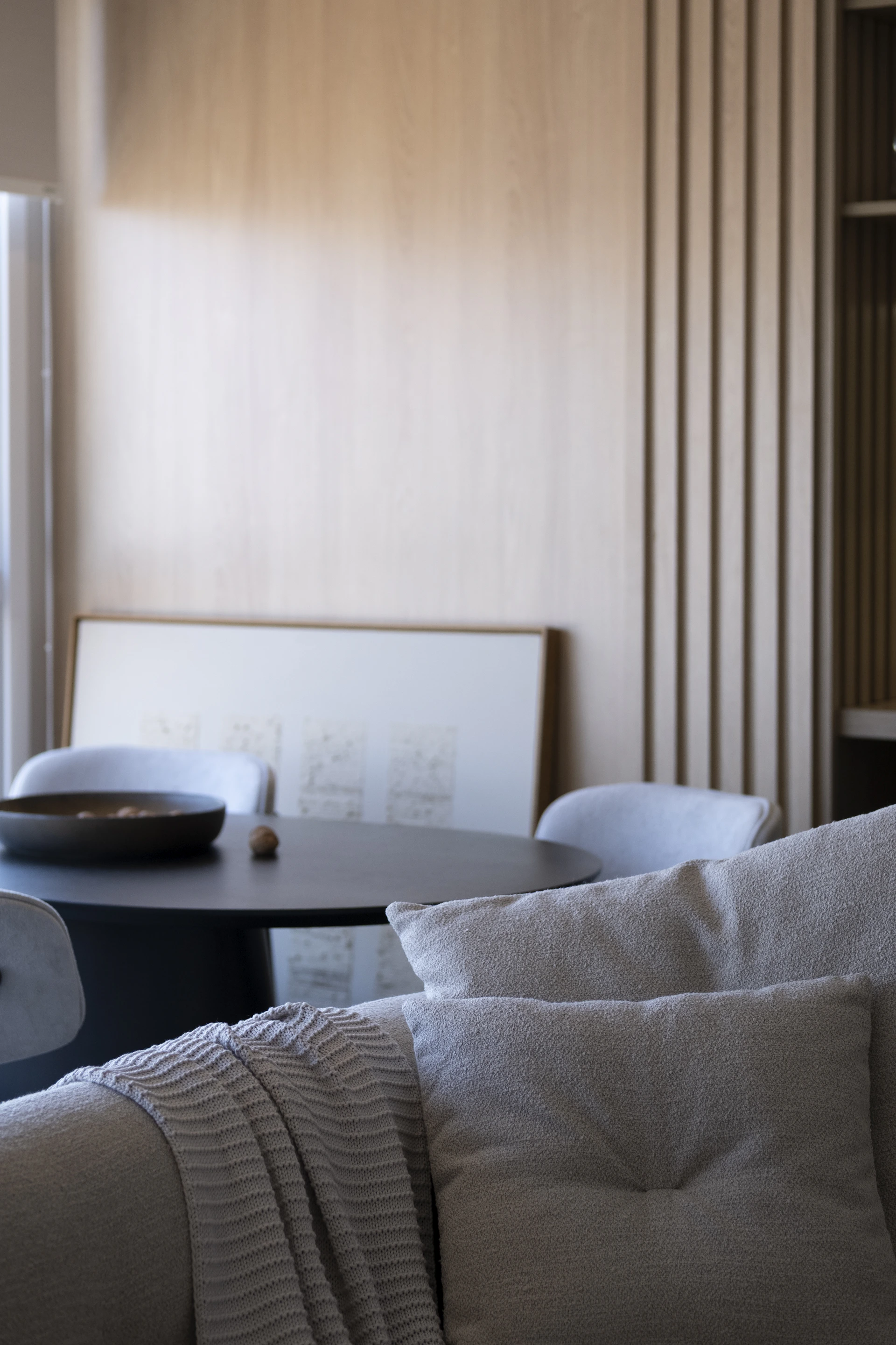 Modern living room with minimalist decor and neutral tones