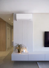 Modern living room with air conditioner and decor
