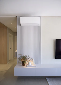Modern living room with air conditioner and decor