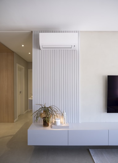 Modern living room with air conditioner and decor